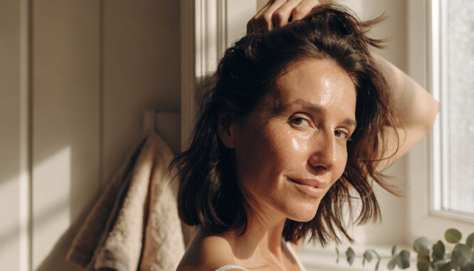 Woman with luminous skin and healthy hair